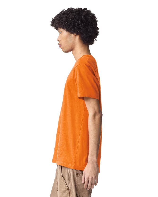 An orange unisex fine jersey short sleeve T-shirt, displayed from the side, featuring a brand logo.