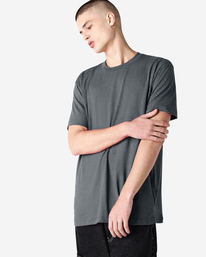 A grey unisex CVC short sleeve t-shirt displayed on a model with a neutral background.