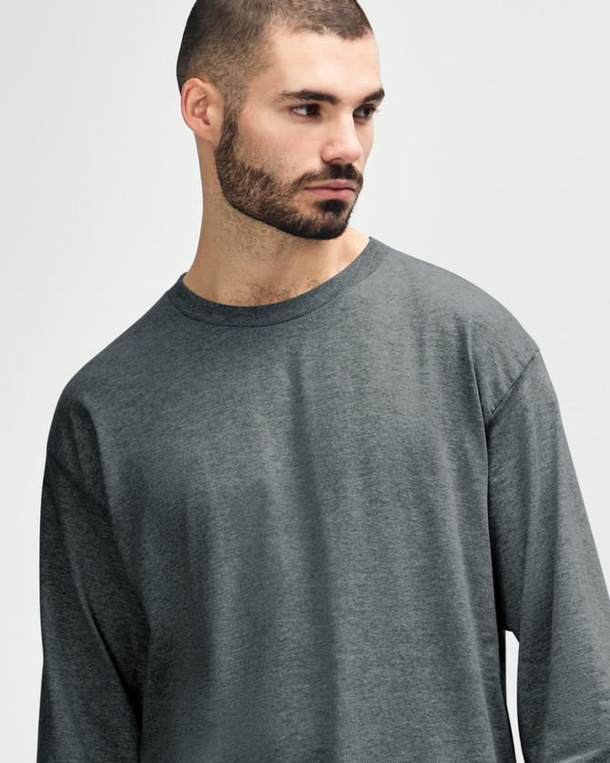 A long sleeve T-shirt in a charcoal grey colour, featuring a relaxed fit and minimal branding.