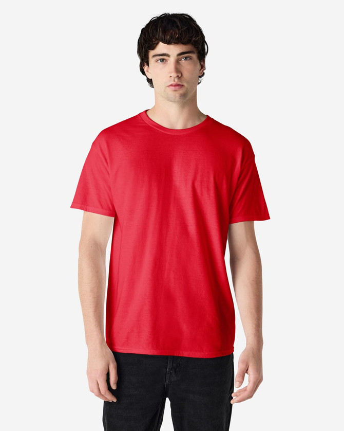 A red Gildan Heavy Cotton adult t-shirt displayed on a model. The shirt has a logo branding.