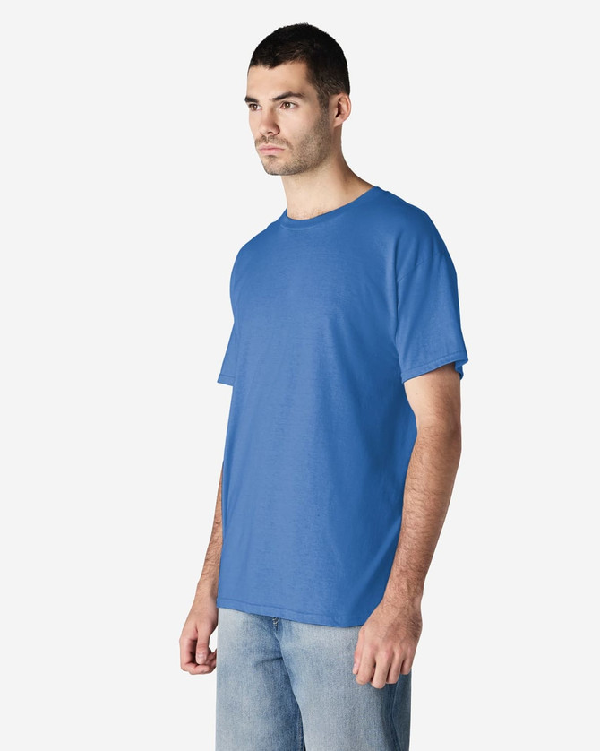 A blue Gildan Heavy Cotton Adult T-Shirt displayed on a model, featuring a brand logo.