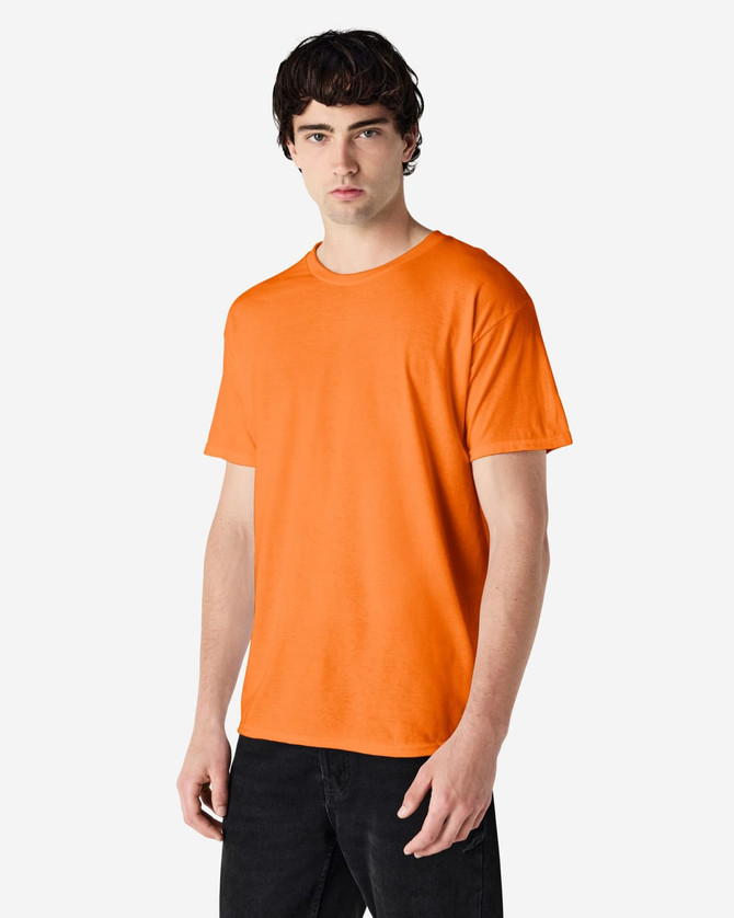 An orange adult t-shirt displayed on a model, featuring a round neckline and short sleeves. It has a logo.