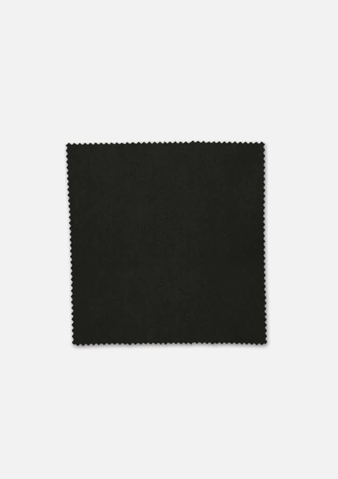 A square piece of black fabric with a textured edge, featuring a dark and smooth surface.