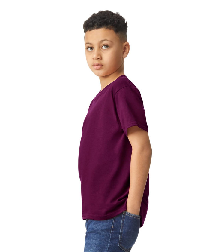 A youth t-shirt in a rich purple colour with a simple design and a logo on the side.