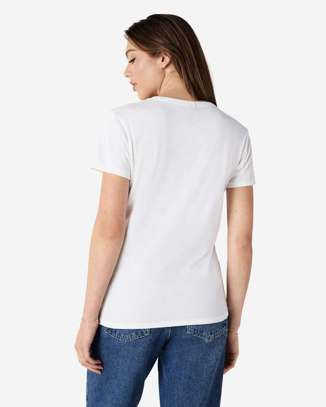 A white ladies' t-shirt with a fitted design, featuring a logo on the back, worn with blue jeans.