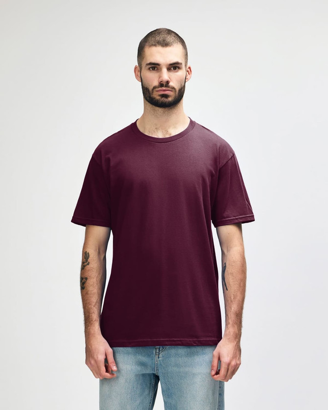 A maroon midweight T-shirt on a male model, featuring a simple design and a logo.