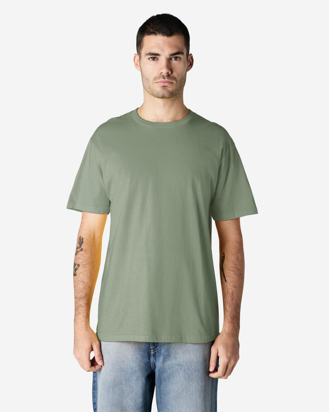 A midweight adult t-shirt in a green colour, featuring a simple design and a logo on the front.