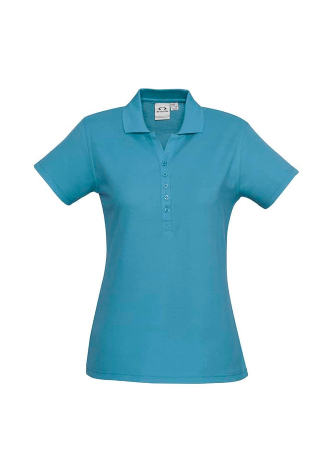 A blue ladies' polo shirt with a collared neckline and short sleeves, featuring a button placket and a logo.