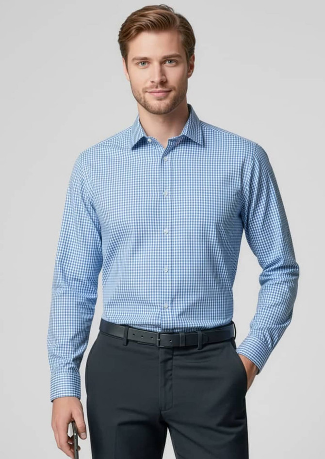 A blue check-patterned long sleeve button-up shirt, featuring a collar and a logo. Styled with black trousers.