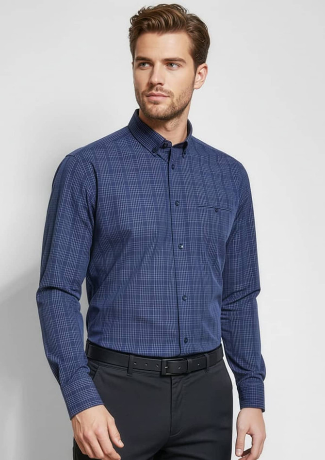 A men's long sleeve shirt in navy blue with a checked pattern and a chest pocket, featuring a logo.