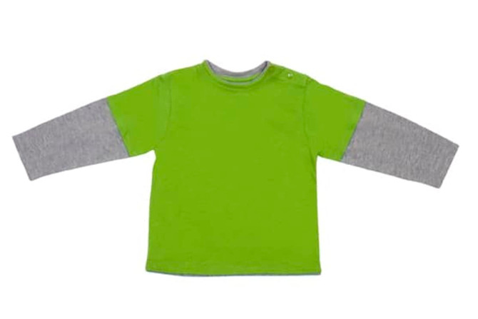 A green kid's double sleeve T-shirt with grey long sleeves and a simple design. It features a small button detail.