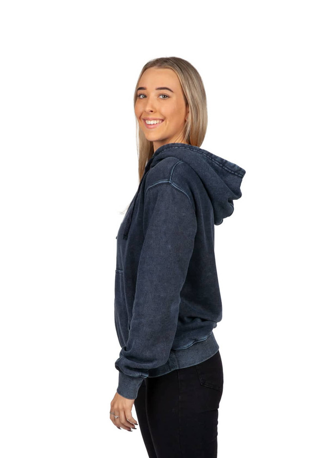 A stone wash fleece hoodie in navy blue, featuring a hood and a relaxed fit, modelled by a woman.