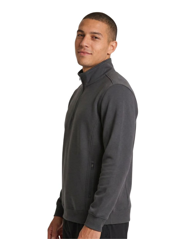 A men's half-zip fleece jumper in navy blue, featuring a side view with a zip pocket and a logo.