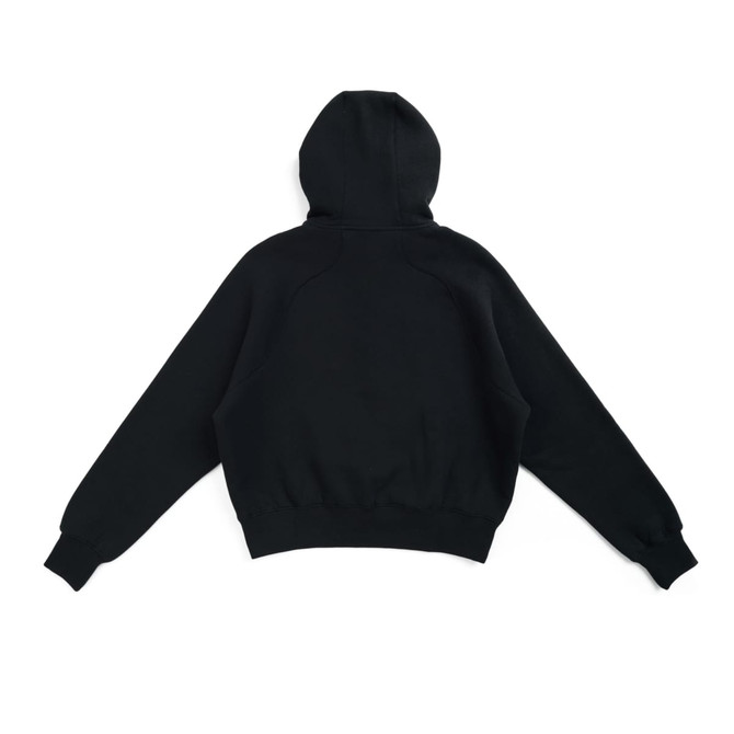 A black cotton half-zip jumper for women/girls, featuring a hood and a relaxed fit. It has a logo on it.