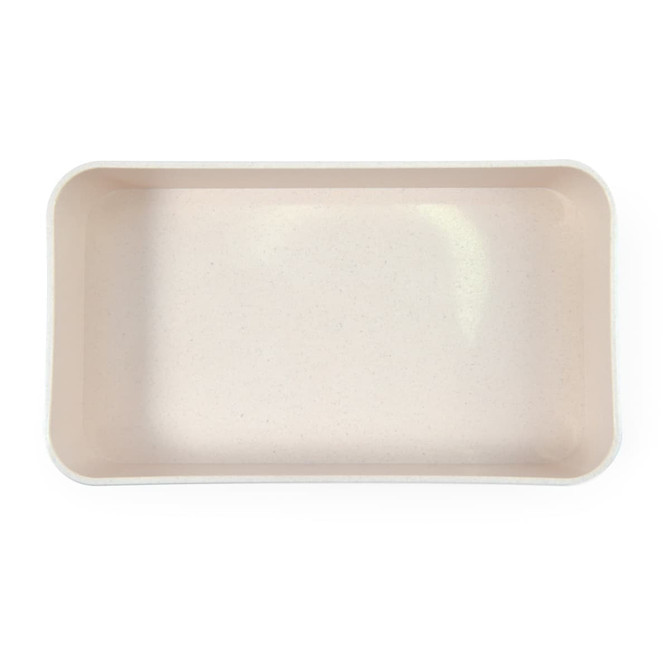 A rectangular lunch box in a neutral beige color, featuring a smooth, textured interior with rounded edges.