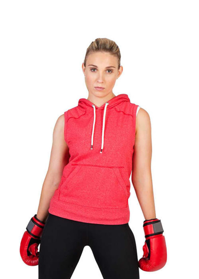 A sleeveless red hoodie with a front pocket and a hood, modelled by a person wearing boxing gloves.