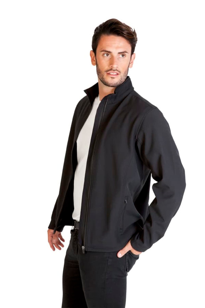 A man wearing a black soft shell jacket with a high collar and a zippered front, featuring pockets and a logo.