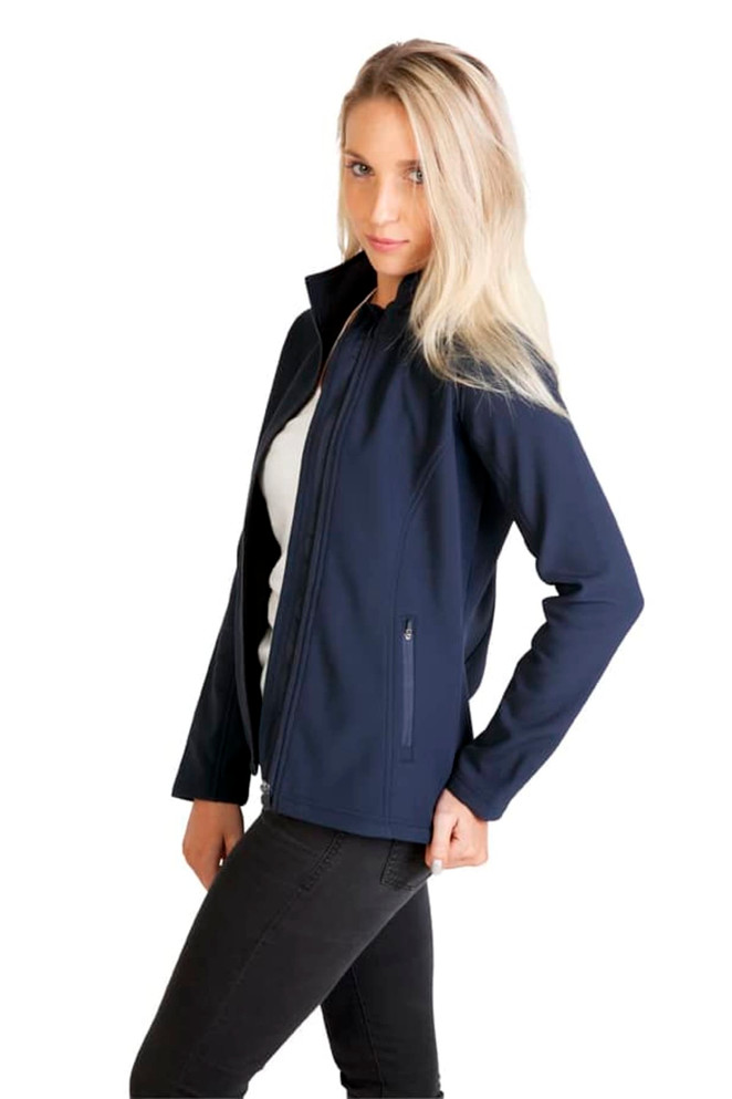 A women's soft shell jacket in navy blue, featuring a zip front and side pockets, modelled by a woman.