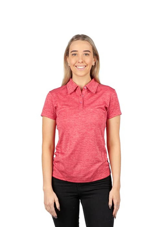 A female model wearing a pink polo shirt made of 100% polyester, featuring a collar and buttons.