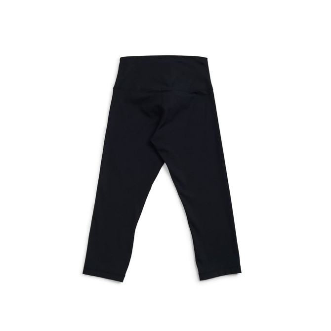 A pair of black high-rise 3/4 leggings with a smooth finish and a waistband, featuring a logo.