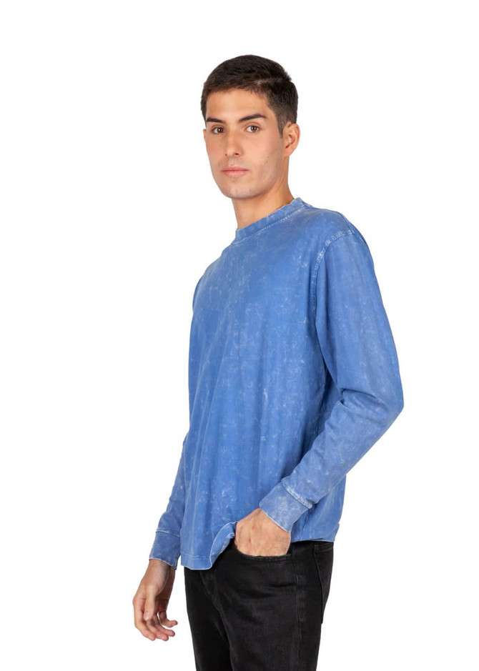 A long sleeve stone wash T-shirt in blue, featuring a casual fit and a logo on the design.