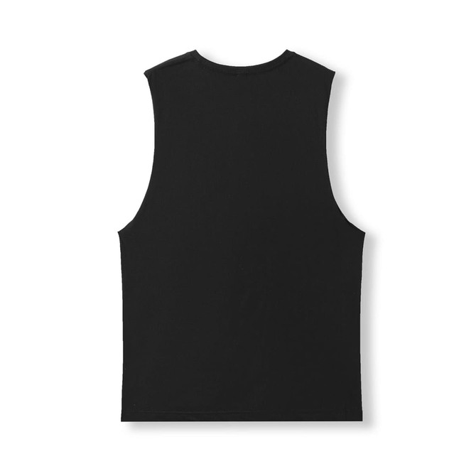 A black unisex tank top made from combed cotton, featuring a simple design with no visible logos.