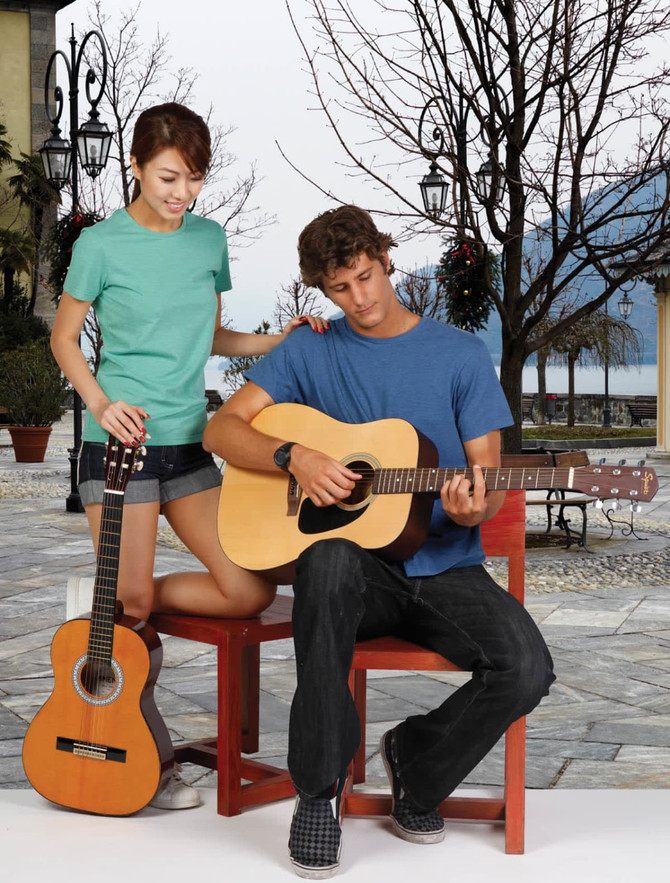 A blue and a green Men's Heavy Marl T-shirt worn by models, one playing guitar outdoors.