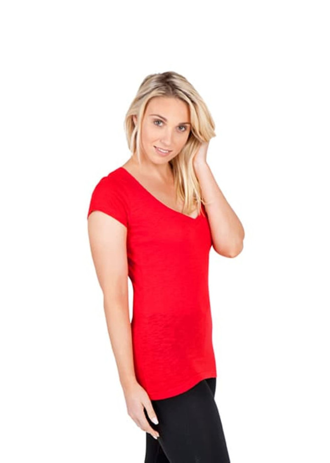 A red women's v-neck t-shirt made from raw cotton, featuring a relaxed fit and a model posing. It has a logo.