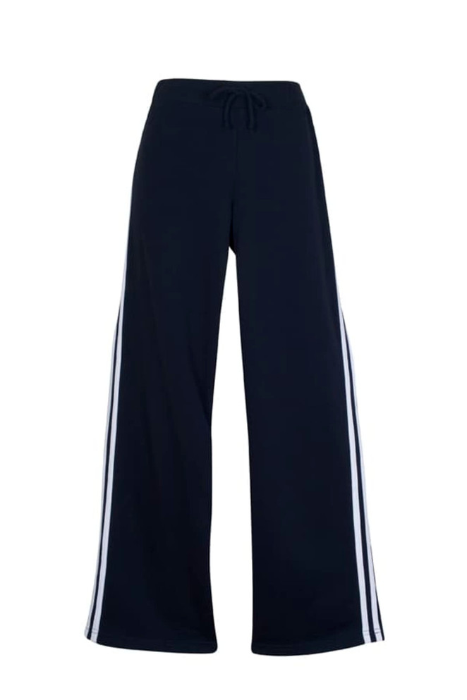 Women's striped track pants in navy with white side stripes and an elastic waistband. Features a logo.