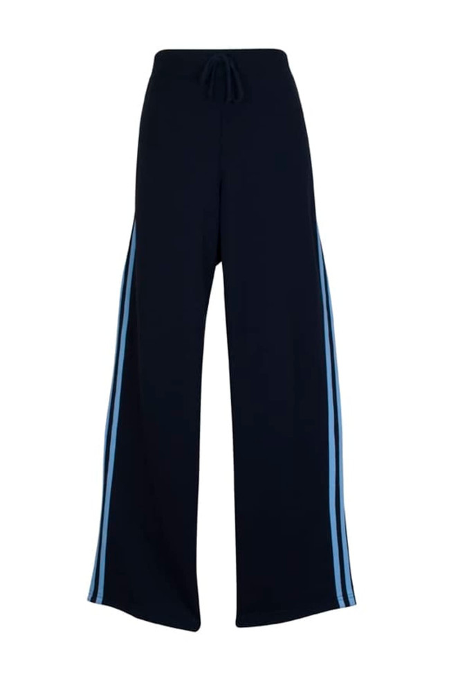 Wide-leg track pants in black with light blue stripes, featuring an elastic waistband and drawstring.
