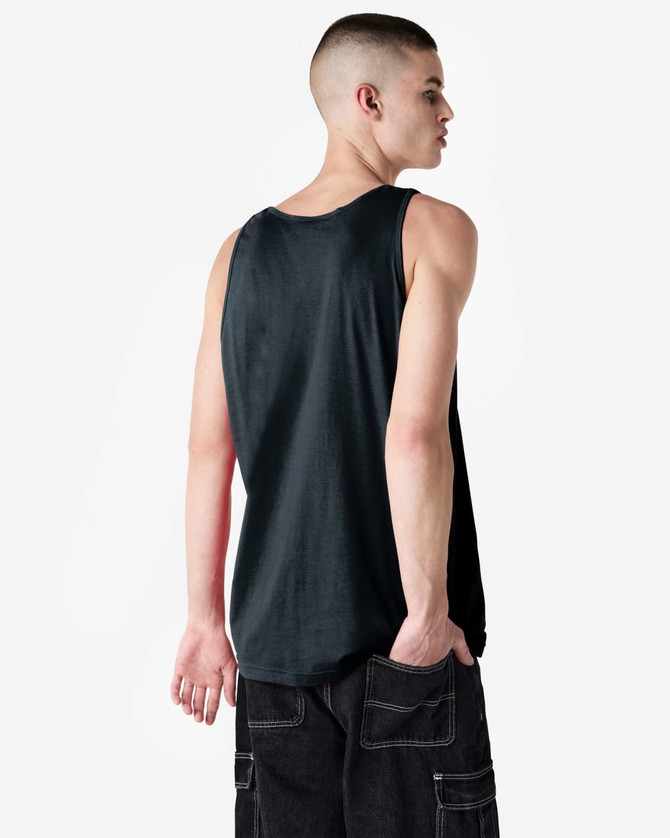 A black unisex fine jersey tank top is worn by a model, featuring a simple design and a logo.