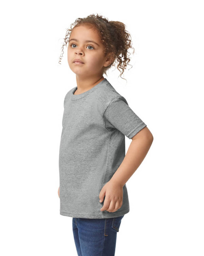 A grey toddler t-shirt displayed on a child, featuring short sleeves and a round neckline, with a logo visible.