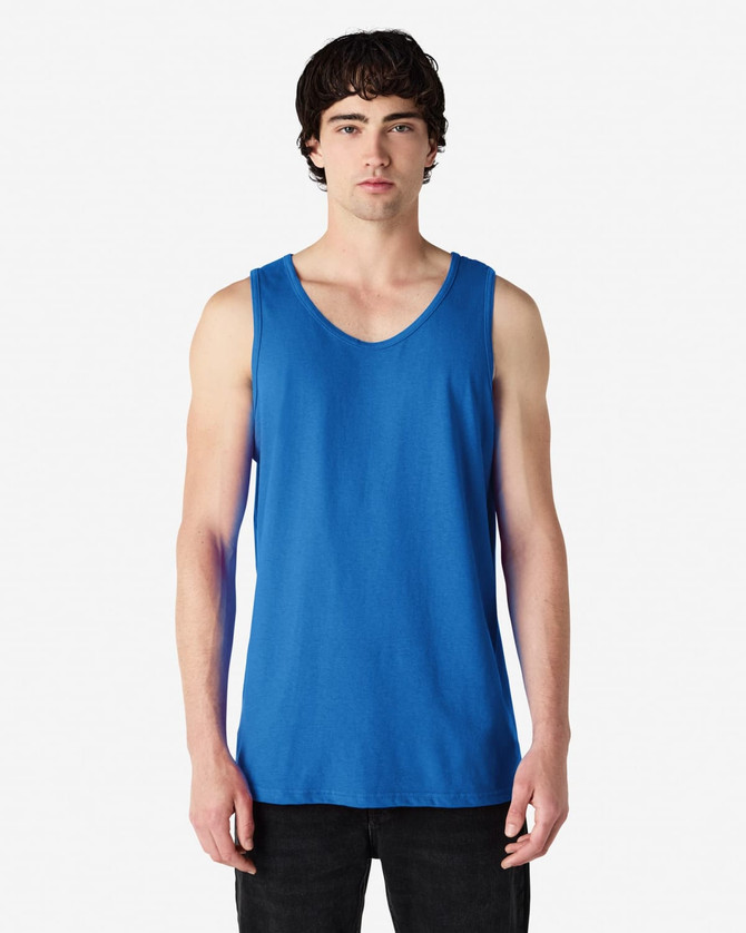 A blue Gildan Heavy Cotton adult tank top on a male model, featuring a plain design and a logo.