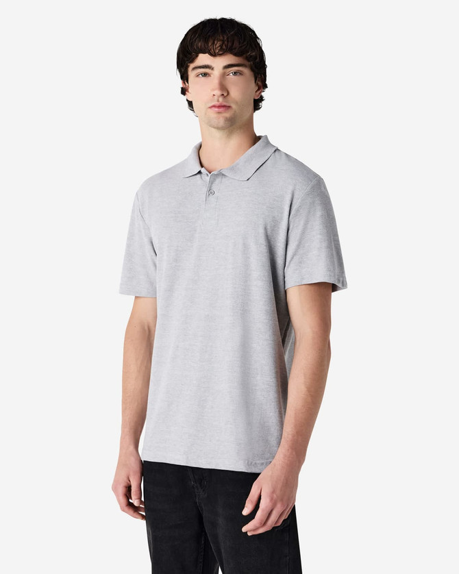A grey Gildan Softstyle Adult Double Pique Polo with a collar, displayed on a male model. The shirt has a subtle logo.