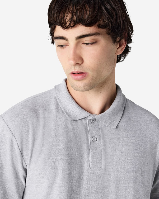 A grey Gildan Softstyle adult double pique polo shirt featuring a collar and three-button placket.