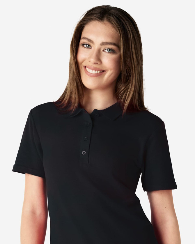 A black ladies' polo shirt made from soft pique fabric, featuring a classic collar and buttons.
