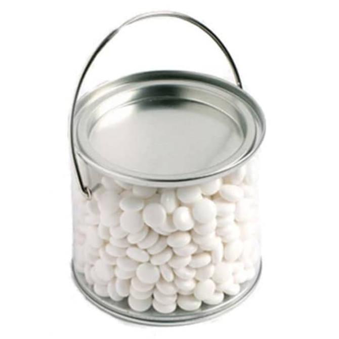 A medium clear PVC bucket filled with white chewy mints, featuring a silver lid and handle.