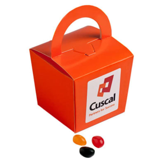 An orange noodle box containing colourful jelly beans with a handle. The box features a logo.