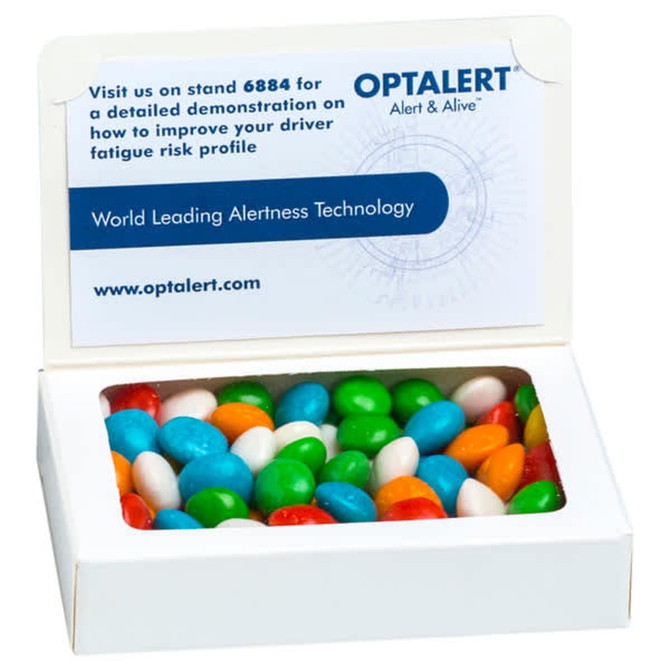 A box of chewy fruit jelly beans in various colours, featuring a branding logo on the lid.