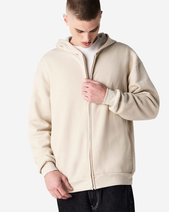 A unisex full zip hooded sweatshirt in a light cream colour, featuring a hood and front zipper.