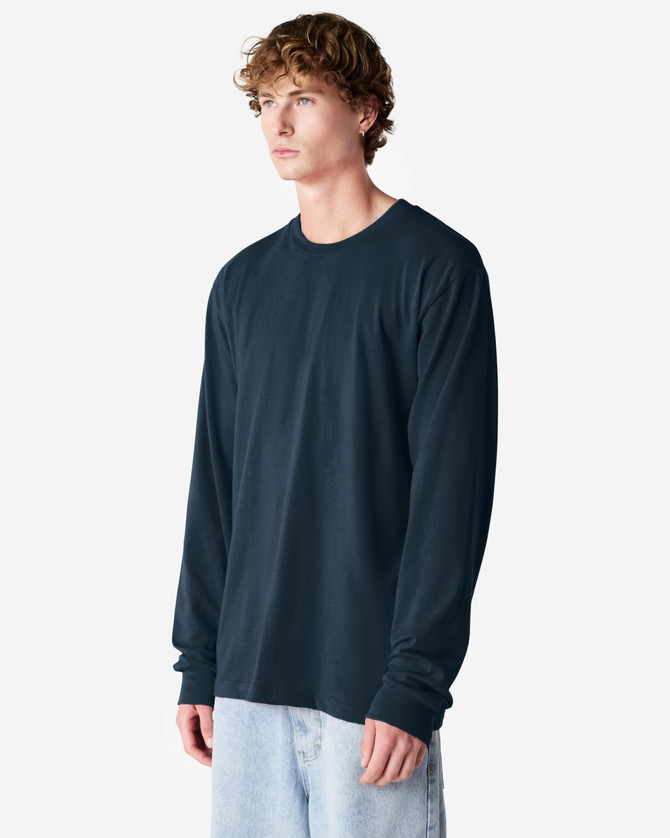 A long sleeve t-shirt in navy blue, featuring a simple design and a logo on the chest.