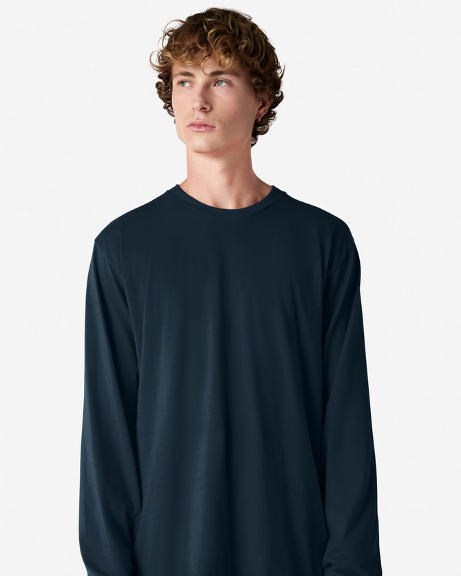 A long sleeve t-shirt in navy blue, featuring a round neckline and a fitted silhouette, with a logo present.