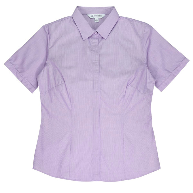 A short-sleeve button-up shirt in light purple with a fitted design and a collar. Features a branding logo.