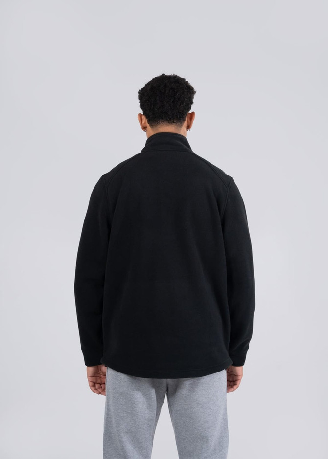 A black polar fleece half zip top for men/unisex, featuring a relaxed fit and a logo on the back.