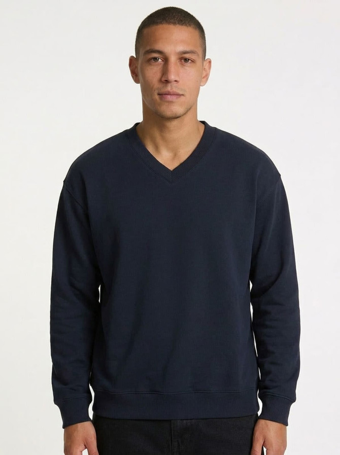 A men's/unisex navy V-neck fleece jumper with long sleeves and a logo, featuring a classic fit.