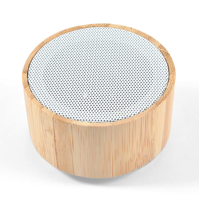 A bamboo Bluetooth speaker featuring a circular design with a perforated upper surface.