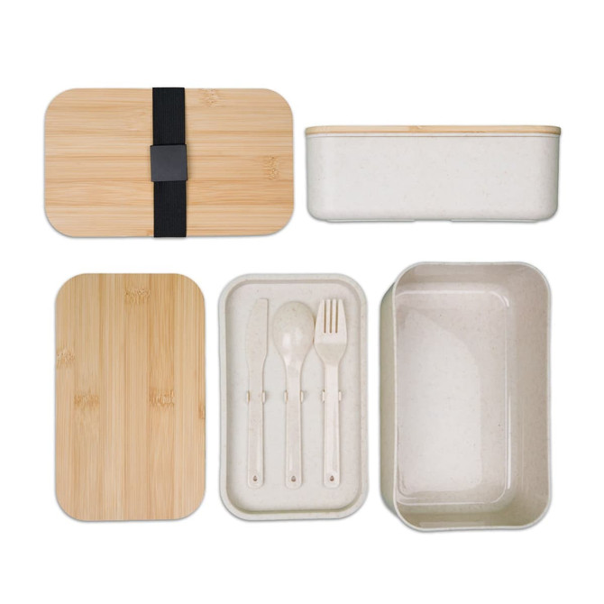 A bamboo-lid lunch box with a white container, featuring a fork, knife, and spoon inside. It has a logo.