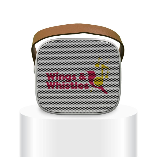 A mini speaker with a white mesh design and a brown strap, featuring a logo on the front.
