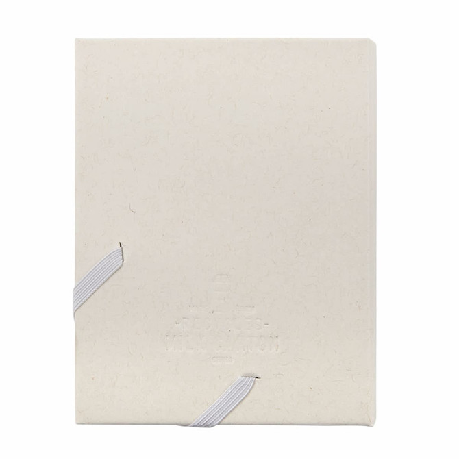 A beige, bound planner with a textured cover, featuring white ribbon ties and an embossed logo.