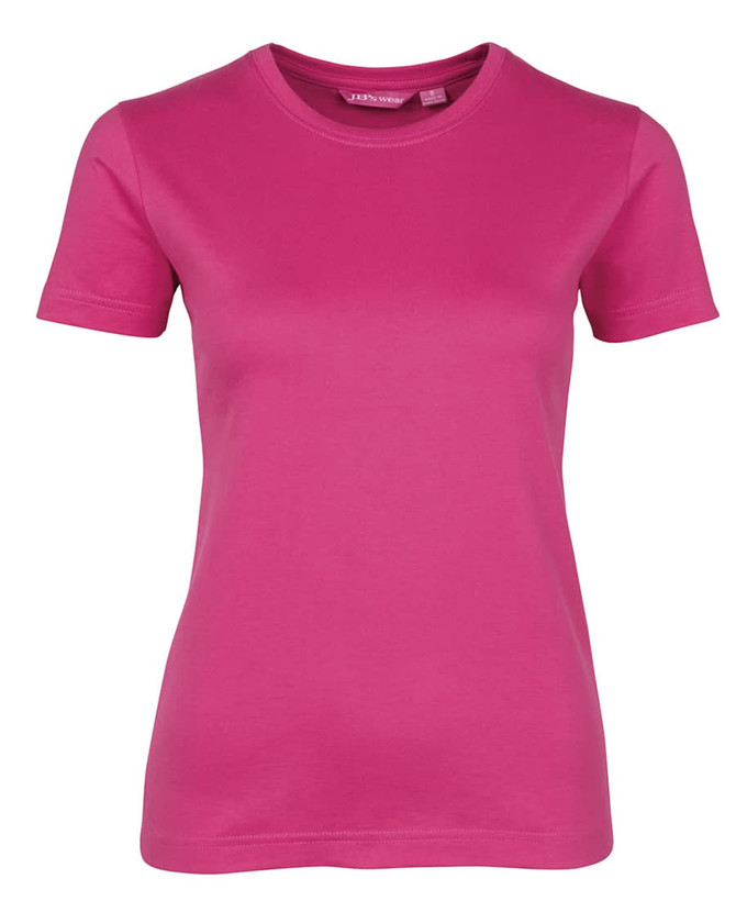 A women's pink T-shirt with short sleeves and a fitted style. It features a logo on the tag.